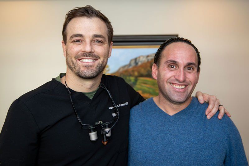Dr. Palmer with his Salt Lake City Dental patient